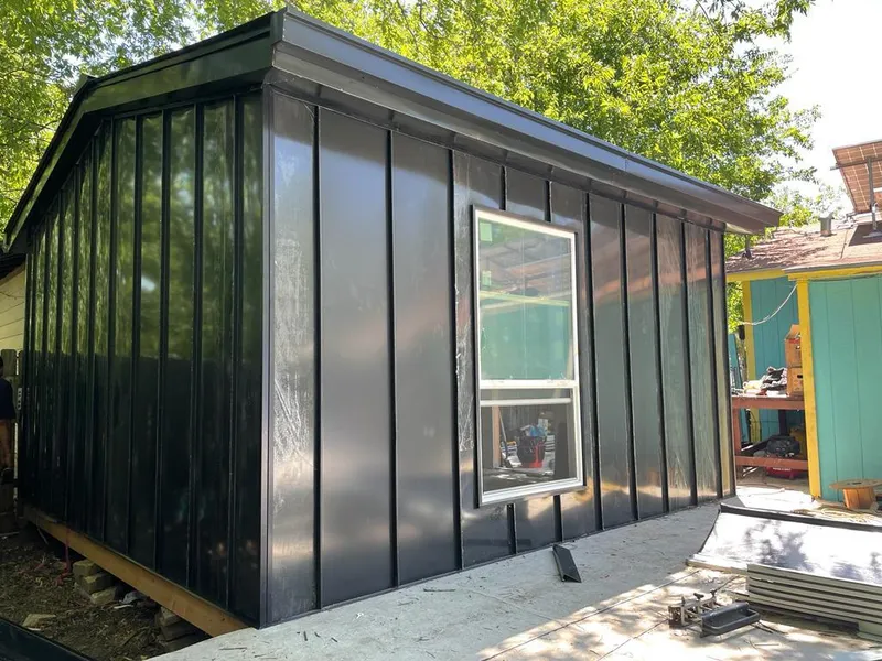 Black standing seam metal wall panels for Roof Inspection in Pinehurst