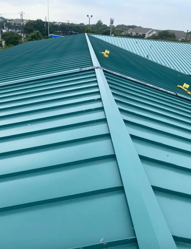 Green commercial metal roof ridge and valley for Metal Roof Repair in Pinehurst